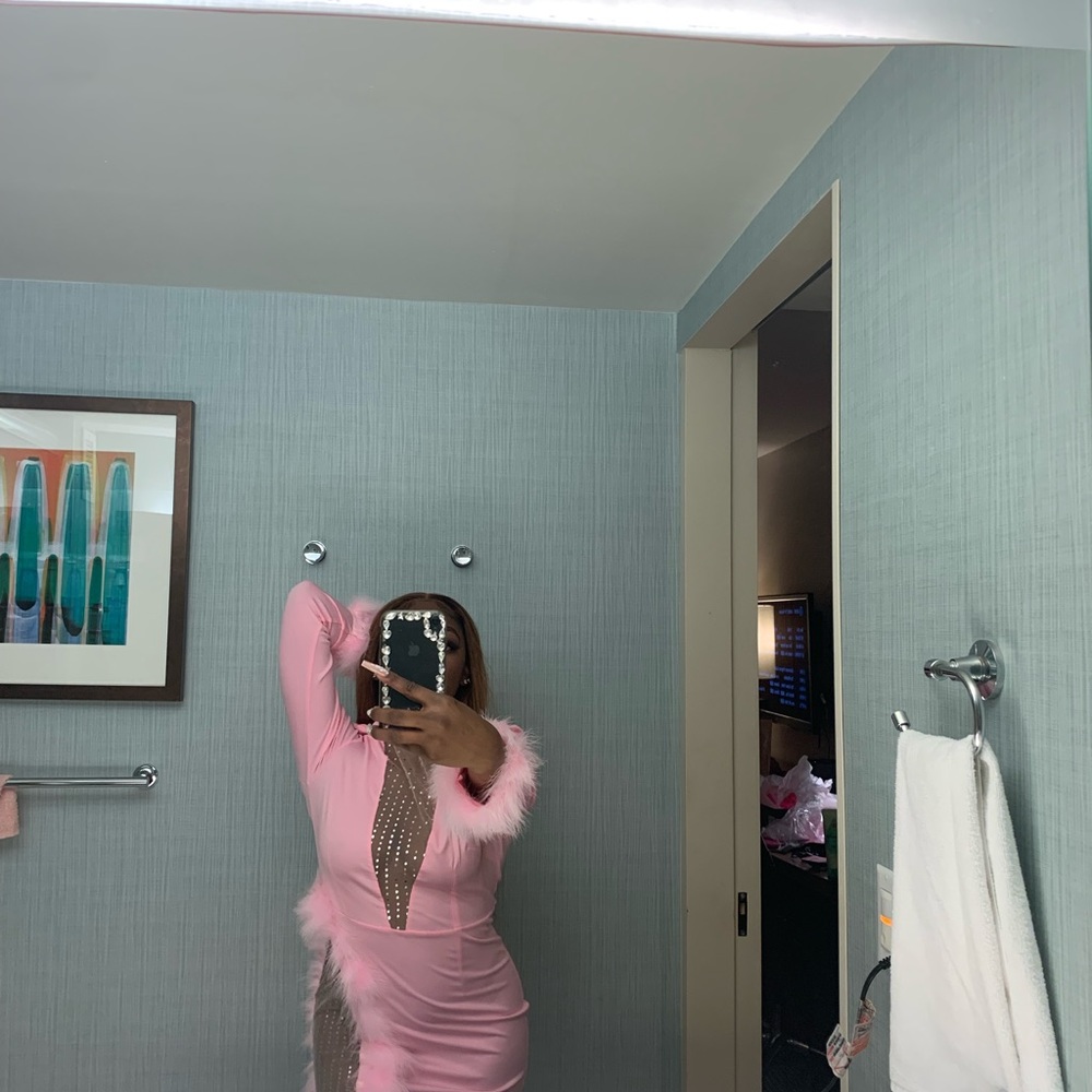 Pink custom dress with Feather sleeves and slit with nude sparkle slit